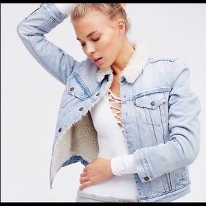 Levi’s east alley light wash denim Sherpa lined trucker jacket free people